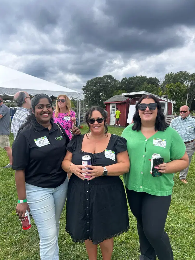 GIM Property Management team members together at an outdoor event